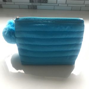 Free brand new makeup pouch w/ purchase